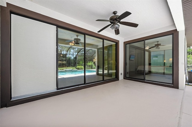 27 Bay Ct, Ormond Beach, FL 32174 - view of patio / terrace featuring ceiling fan and an outdoor pool
