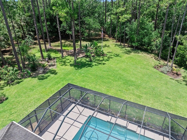 27 Bay Ct, Ormond Beach, FL 32174 - view of green lawn featuring an outdoor pool