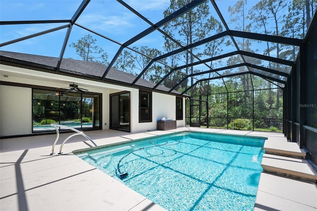 27 Bay Ct, Ormond Beach, FL 32174 - outdoor pool with a patio area, ceiling fan, and a lanai