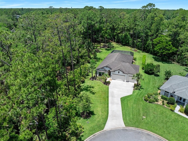 27 Bay Ct, Ormond Beach, FL 32174 - aerial view of property and surrounding area with a heavily wooded area
