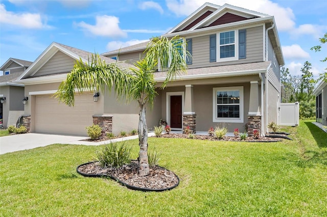 40 Oakleaf Way, Palm Coast, FL 32137 - view of front of home with stucco siding, an attached garage, concrete driveway, and a front lawn