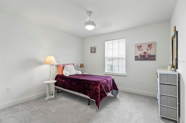40 Oakleaf Way, Palm Coast, FL 32137 - bedroom featuring baseboards, carpet, and a ceiling fan