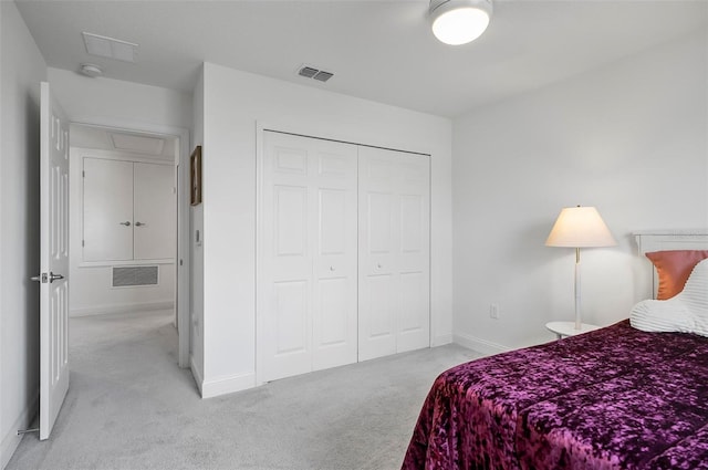 40 Oakleaf Way, Palm Coast, FL 32137 - bedroom with carpet floors, baseboards, attic access, and a closet