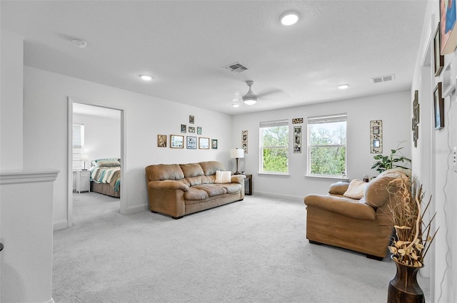 40 Oakleaf Way, Palm Coast, FL 32137 - carpeted living area with ceiling fan, recessed lighting, and baseboards
