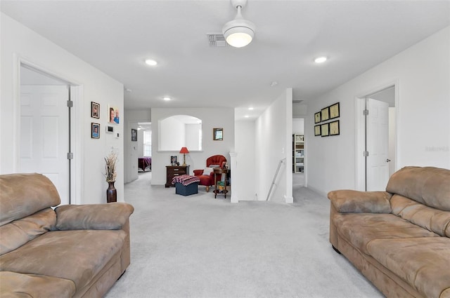 40 Oakleaf Way, Palm Coast, FL 32137 - living area featuring light carpet, recessed lighting, and arched walkways