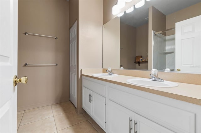 11 Roxboro Dr, Palm Coast, FL 32164 - full bathroom featuring tile patterned flooring, double vanity, a shower, and baseboards