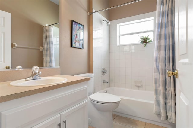 11 Roxboro Dr, Palm Coast, FL 32164 - full bath with shower / tub combo with curtain, tile patterned flooring, toilet, and vanity