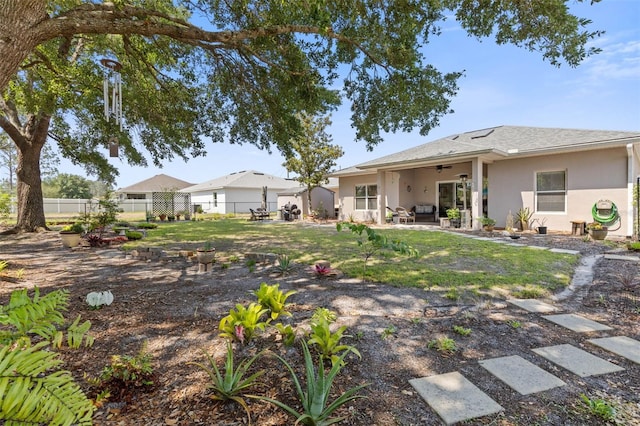 11 Roxboro Dr, Palm Coast, FL 32164 - view of yard with a patio area and ceiling fan