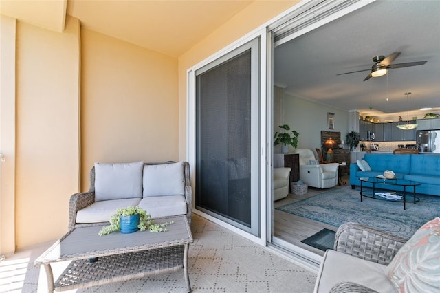 80 Surfview Dr Unit 721, Palm Coast, FL 32137 - balcony featuring an outdoor hangout area and a ceiling fan