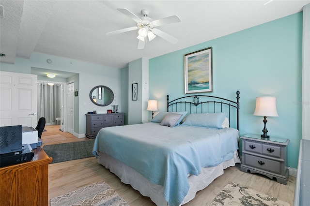 80 Surfview Dr Unit 721, Palm Coast, FL 32137 - bedroom with light wood finished floors and ceiling fan