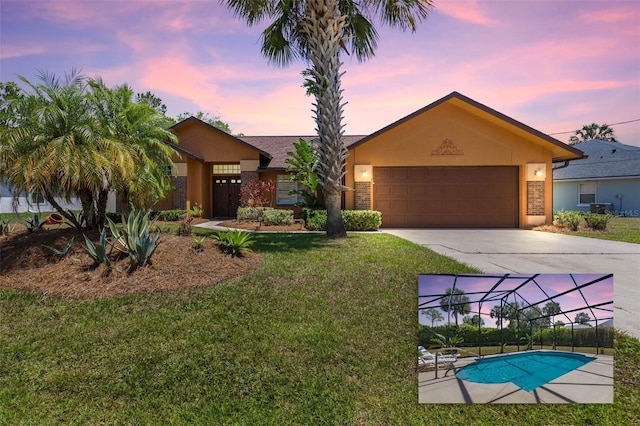 7 White Oak Ln, Palm Coast, FL 32164 - single story home with concrete driveway, a garage, stucco siding, a lawn, and cooling unit