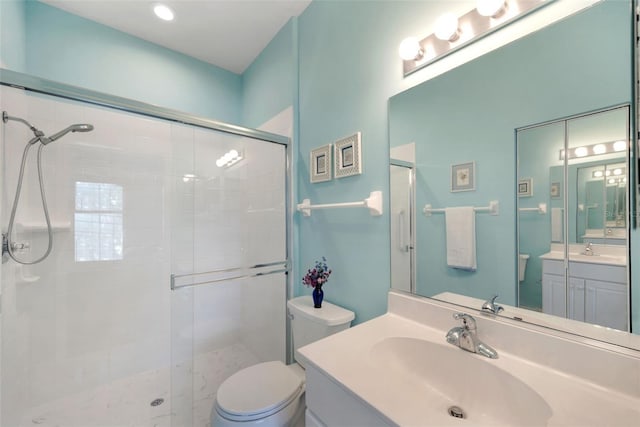 33 Veranda Way Unit 33, Palm Coast, FL 32137 - bathroom with a stall shower, vanity, and toilet