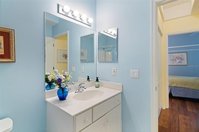 33 Veranda Way Unit 33, Palm Coast, FL 32137 - ensuite bathroom with vanity and wood finished floors