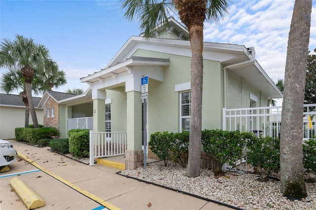 33 Veranda Way Unit 33, Palm Coast, FL 32137 - view of front of home featuring stucco siding