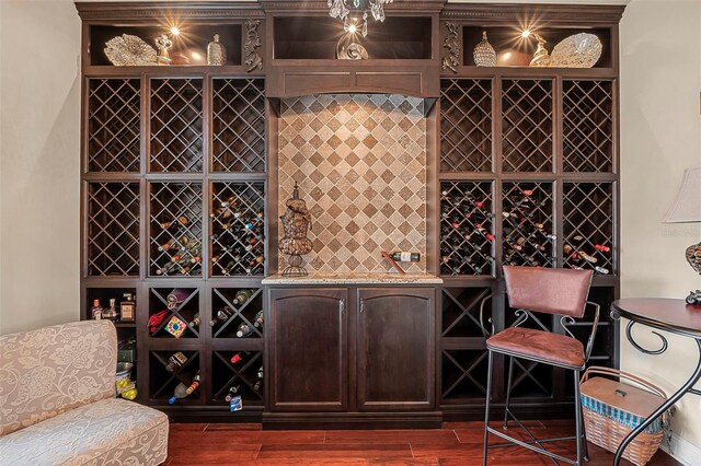 568 Luna Bella Ln, New Smyrna Beach, FL 32168 - wine area with dark wood finished floors