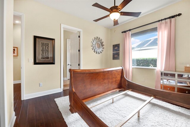 568 Luna Bella Ln, New Smyrna Beach, FL 32168 - bedroom with hardwood / wood-style floors, baseboards, and ceiling fan