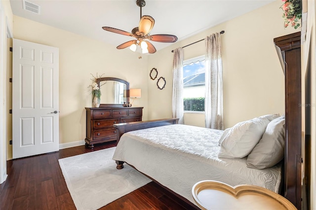 568 Luna Bella Ln, New Smyrna Beach, FL 32168 - bedroom featuring dark wood-type flooring, baseboards, and a ceiling fan