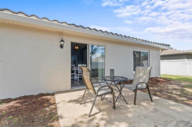 226 Pinegrove Dr, Palm Coast, FL 32164 - view of patio with fence