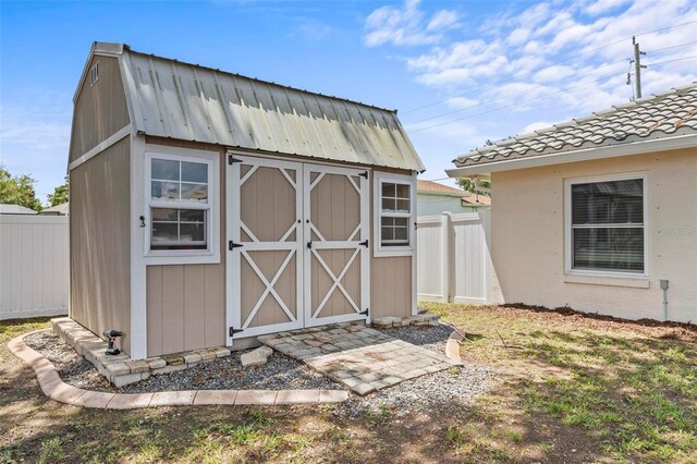 226 Pinegrove Dr, Palm Coast, FL 32164 - view of shed featuring fence