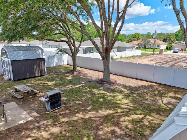 226 Pinegrove Dr, Palm Coast, FL 32164 - fenced backyard with a shed, an outdoor structure, and a residential view