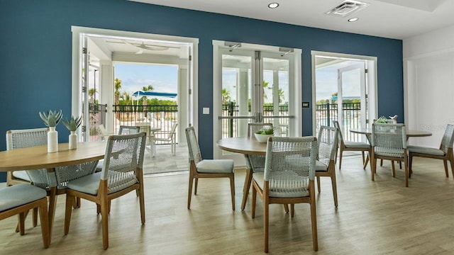 dining room featuring light wood-style floors, recessed lighting, and ceiling fan