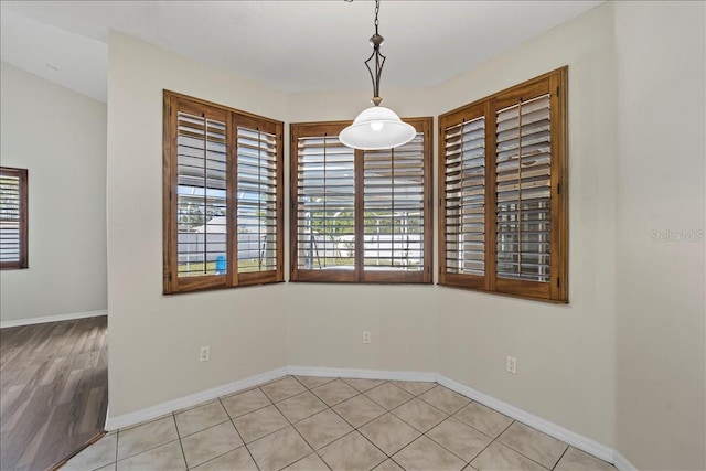 100 Point Pleasant Dr, Palm Coast, FL 32164 - unfurnished dining area featuring baseboards