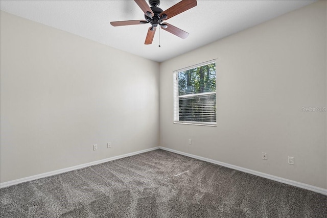 100 Point Pleasant Dr, Palm Coast, FL 32164 - carpeted empty room with baseboards and ceiling fan