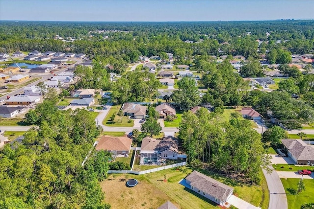 100 Point Pleasant Dr, Palm Coast, FL 32164 - view of property location with nearby suburban area and a heavily wooded area