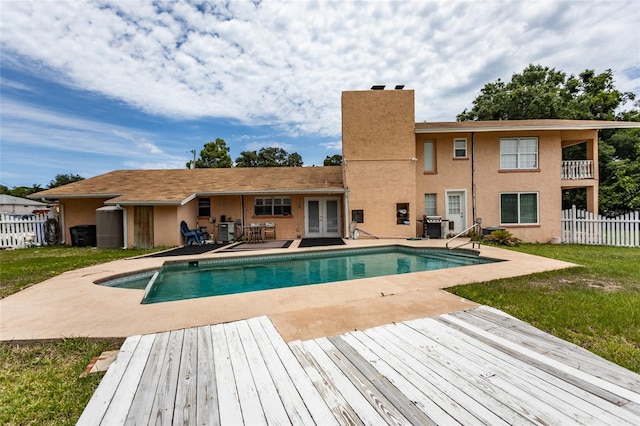 5009 Shore Dr, Saint Augustine, FL 32086 - view of pool with french doors, a patio, area for grilling, and a deck