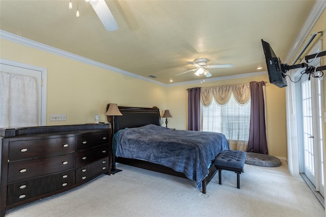 5009 Shore Dr, Saint Augustine, FL 32086 - bedroom with light carpet, multiple windows, crown molding, and a ceiling fan