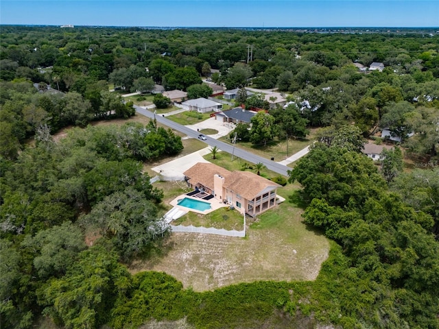 5009 Shore Dr, Saint Augustine, FL 32086 - drone / aerial view of a pool area and a heavily wooded area