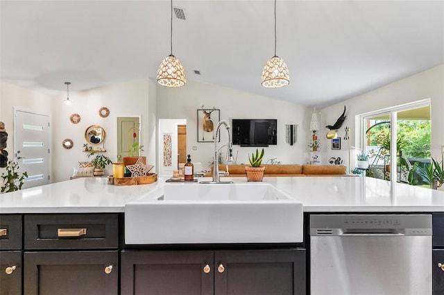 40 Biscayne Dr, Palm Coast, FL 32137 - kitchen featuring dishwasher, a sink, open floor plan, light countertops, and vaulted ceiling