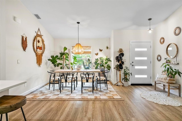 40 Biscayne Dr, Palm Coast, FL 32137 - dining area with wood finished floors and baseboards