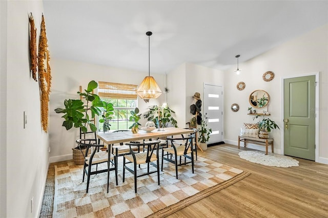 40 Biscayne Dr, Palm Coast, FL 32137 - dining space featuring baseboards and light wood-style floors