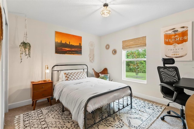 40 Biscayne Dr, Palm Coast, FL 32137 - bedroom with baseboards and carpet