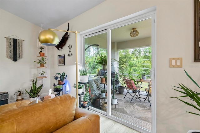 40 Biscayne Dr, Palm Coast, FL 32137 - doorway to outside featuring wood finished floors