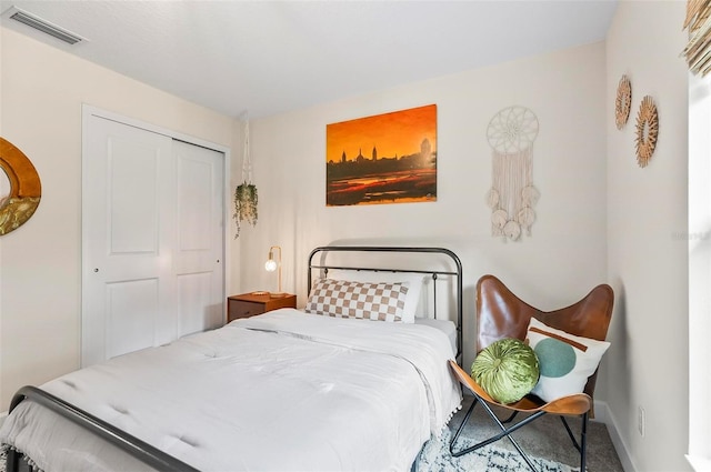 40 Biscayne Dr, Palm Coast, FL 32137 - bedroom with a closet, carpet floors, and baseboards