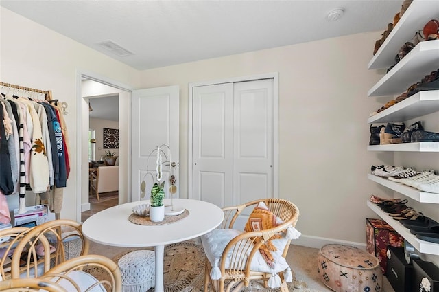 40 Biscayne Dr, Palm Coast, FL 32137 - carpeted dining space featuring baseboards