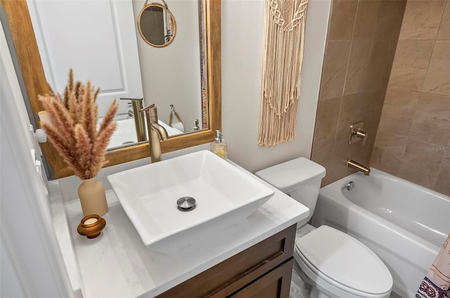 40 Biscayne Dr, Palm Coast, FL 32137 - full bath with toilet, vanity, and shower / tub combination