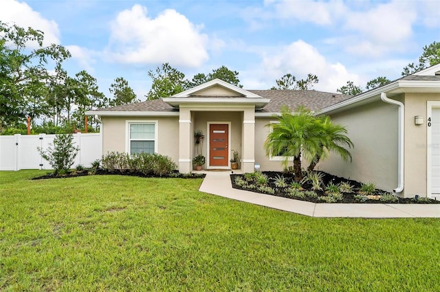 40 Biscayne Dr, Palm Coast, FL 32137 - view of front of house featuring stucco siding and a shingled roof