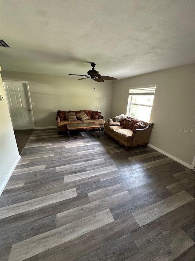 4 Sleepy Hollow Trl, Palm Coast, FL 32164 - living area with ceiling fan, wood finished floors, and baseboards