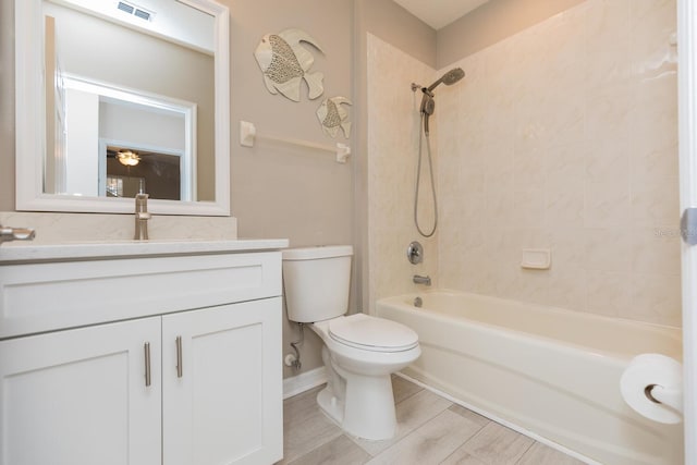 600 Canopy Walk Ln Unit 634, Palm Coast, FL 32137 - full bathroom featuring toilet, shower / washtub combination, and vanity
