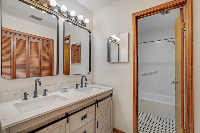 1466 Arena Rd, Fleming Island, FL 32003 - bathroom featuring double vanity and washtub / shower combination