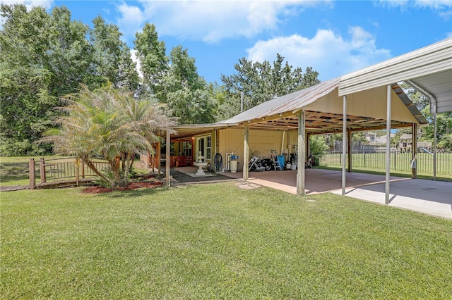 1466 Arena Rd, Fleming Island, FL 32003 - view of yard featuring a carport