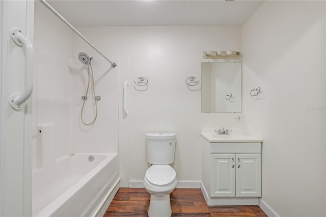 1466 Arena Rd, Fleming Island, FL 32003 - bathroom featuring wood finished floors, toilet, vanity, baseboards, and shower / bathtub combination