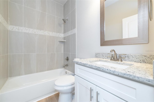 47 Providence Ln, Palm Coast, FL 32164 - full bathroom with toilet, vanity, bathtub / shower combination, and wood finished floors