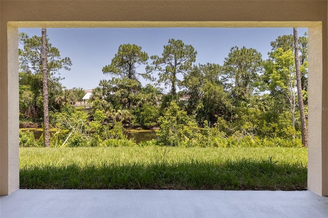 47 Providence Ln, Palm Coast, FL 32164 - view of yard featuring a patio