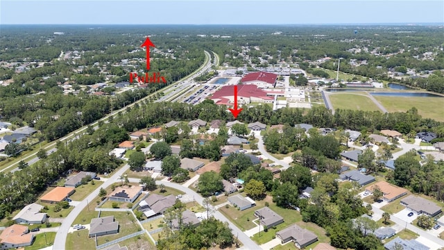 47 Providence Ln, Palm Coast, FL 32164 - aerial overview of property's location with nearby suburban area and a large body of water