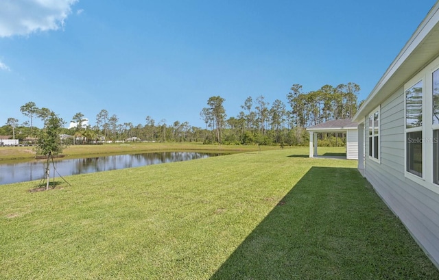 9 Wandering Crk, Way, Palm Coast, FL 32164 - view of green lawn featuring a water view