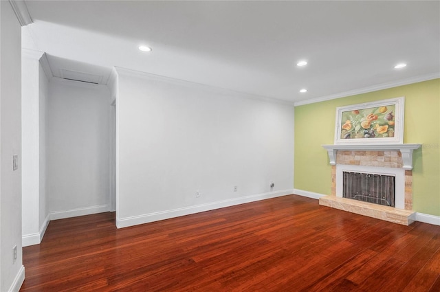 8 Oakmont Ct Unit 0, Palm Coast, FL 32137 - unfurnished living room featuring wood finished floors, a fireplace, baseboards, recessed lighting, and crown molding